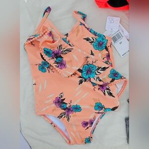 Jessica Simpson Coral baby swimsuit with colorful flowers throughout